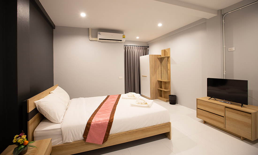 ห้องพักรายวัน ราคาประหยัด ฟรี Wi-Fi และที่จอดรถ